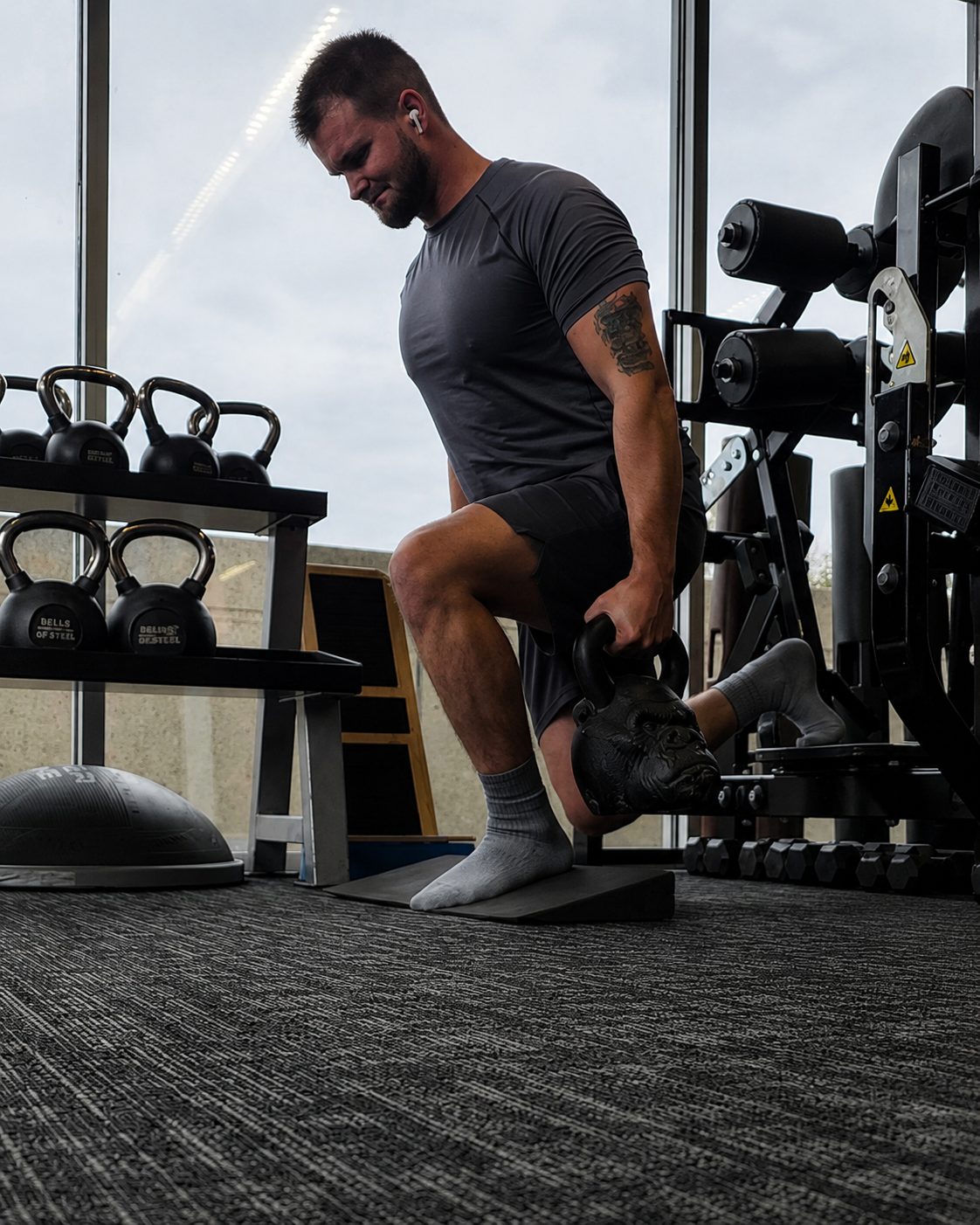Brian Shade coaching a kettlebell lift